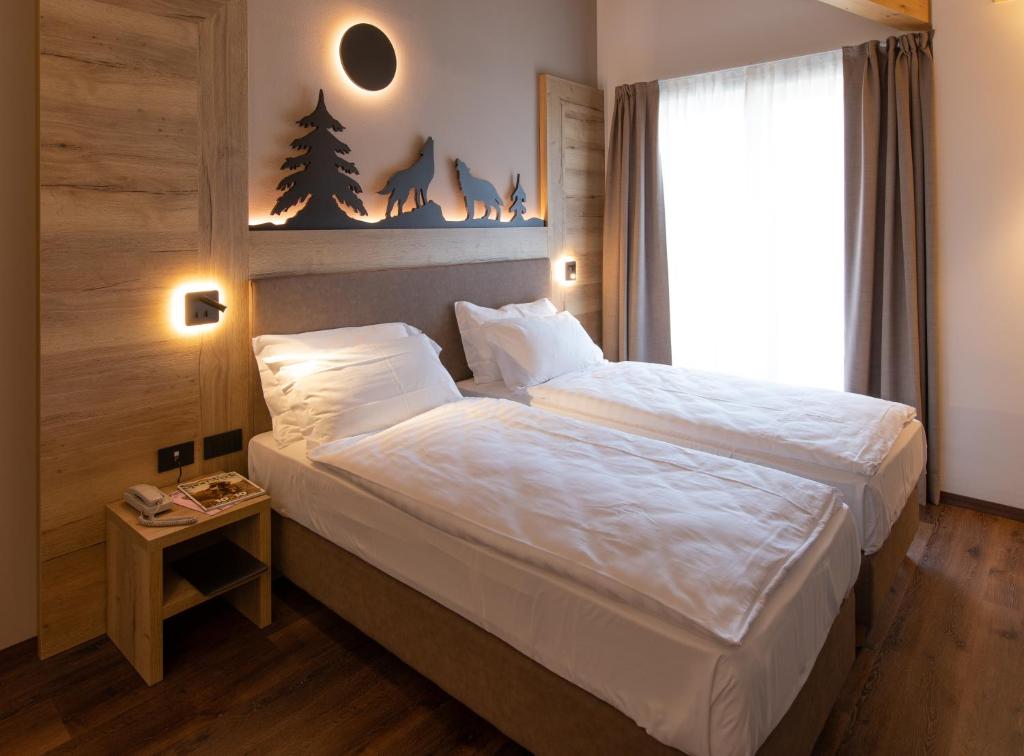 Postel nebo postele na pokoji v ubytování Àlia Bianca Active & Family Hotel