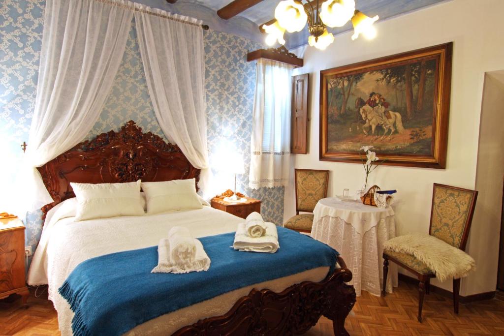 Postel nebo postele na pokoji v ubytování Casa Rural La Casona