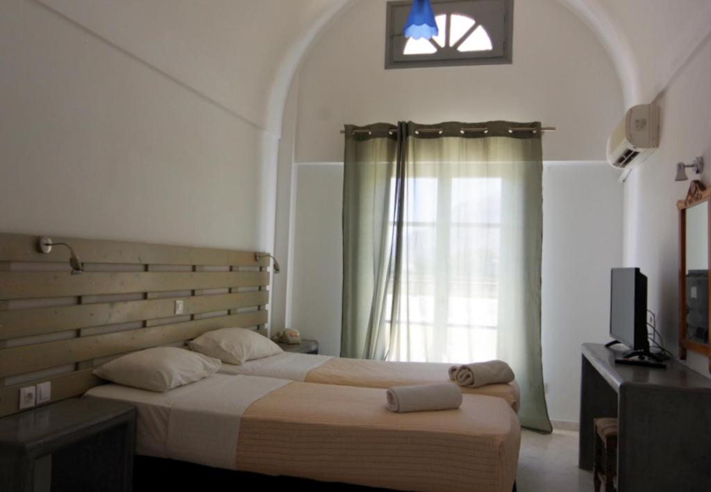 Postel nebo postele na pokoji v ubytování HOTEL MOHITERO
