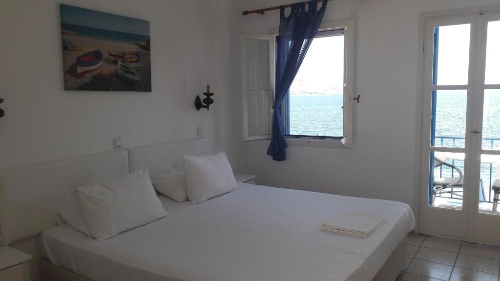 Posteľ alebo postele v izbe v ubytovaní Pavlos Rooms