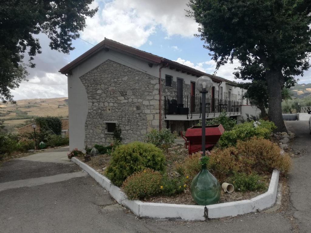 a house with a garden in front of it at B&B Pozzo Innamorato in Montenero di Bisaccia