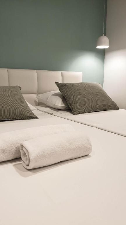 Posteľ alebo postele v izbe v ubytovaní Fiorino Rooms Korčula