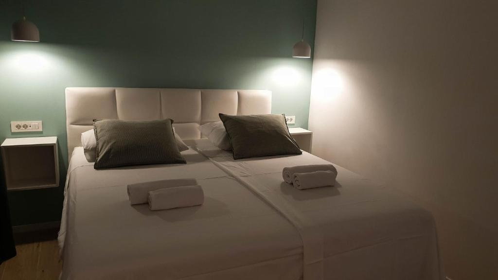 Posteľ alebo postele v izbe v ubytovaní Fiorino Rooms Korčula