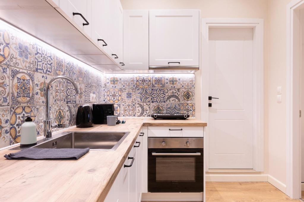 Kuchyňa alebo kuchynka v ubytovaní Casa Moderna -Two Bedroom Apartment