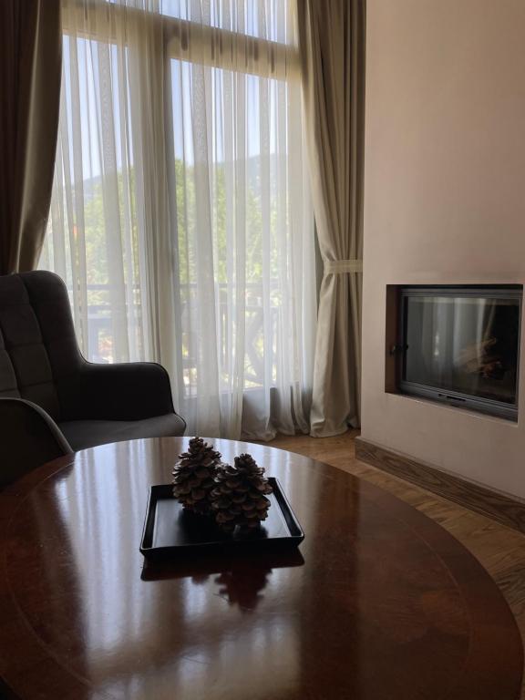 TV a/nebo společenská místnost v ubytování Tagli Resort & Villas