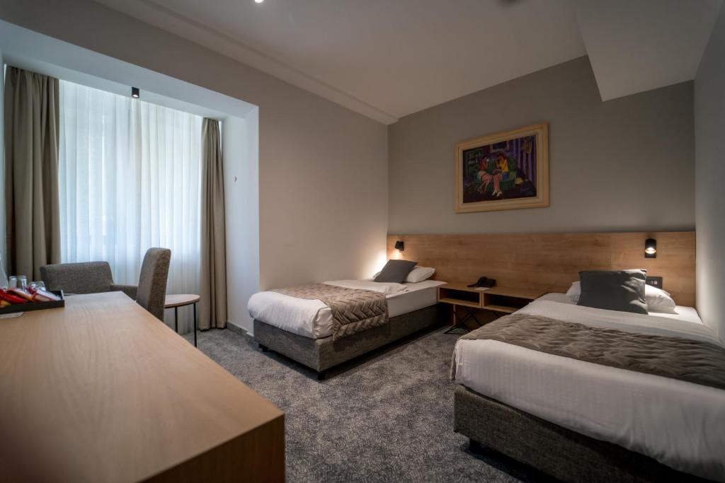 Krevet ili kreveti u jedinici u okviru objekta Mona Plaza Zlatibor