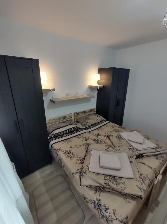 Postel nebo postele na pokoji v ubytování MDC Apartments