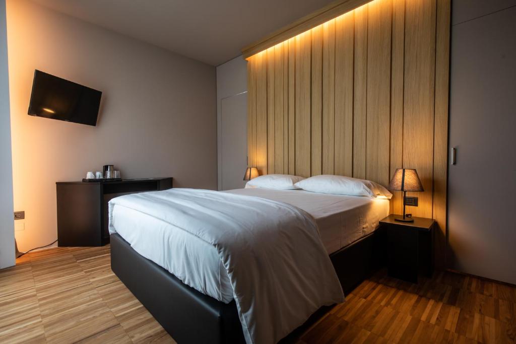 Postel nebo postele na pokoji v ubytování La Locanda Del Grop