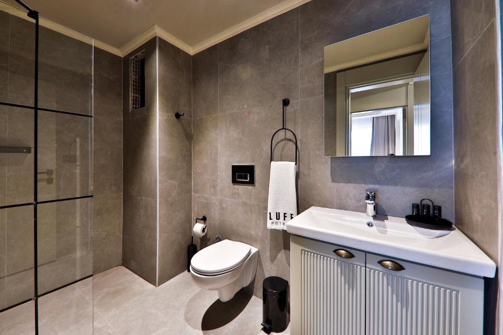 Koupelna v ubytování Luff Suites