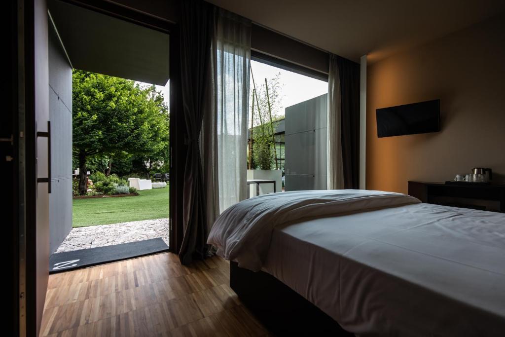 Postel nebo postele na pokoji v ubytování La Locanda Del Grop