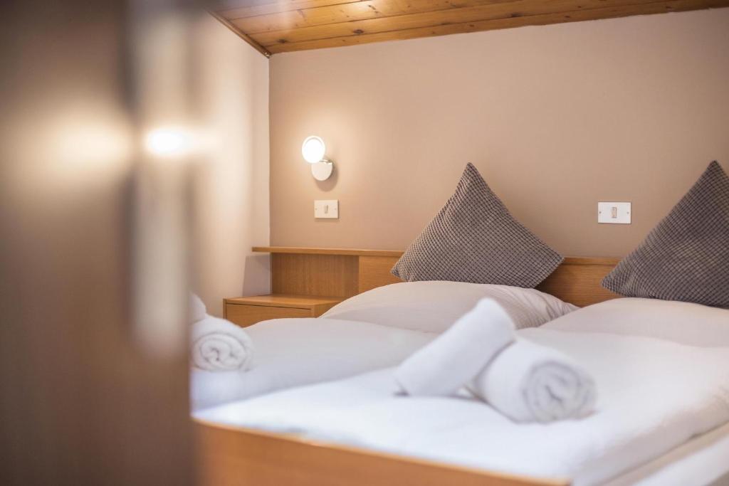 Postel nebo postele na pokoji v ubytování Apt Hofer Heidi