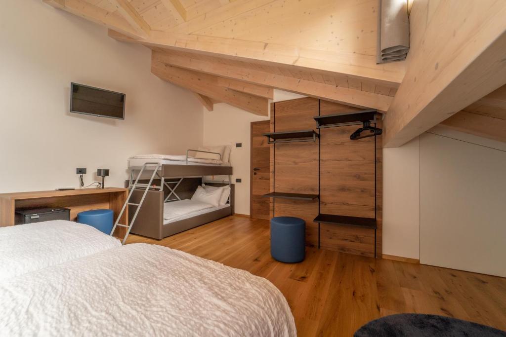 A bed or beds in a room at Agritur La Crucola