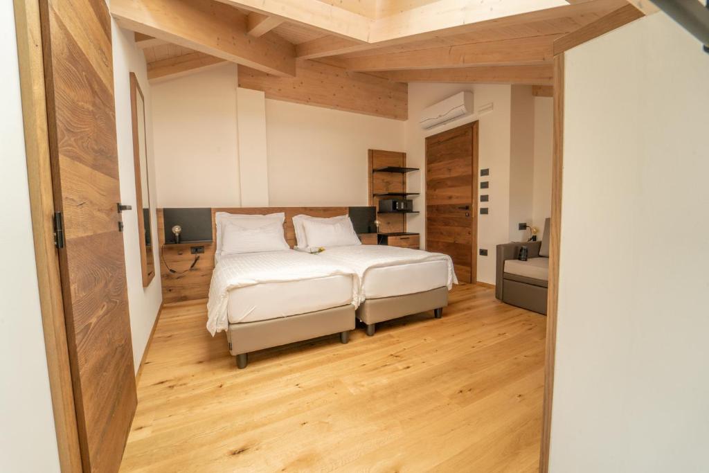A bed or beds in a room at Agritur La Crucola