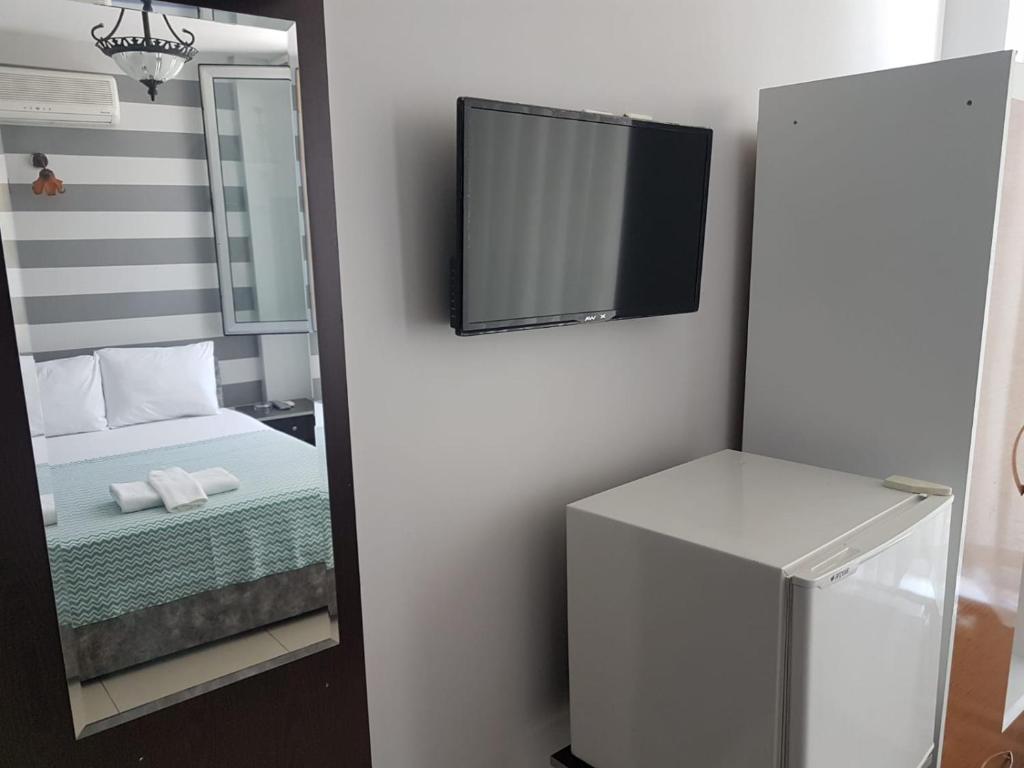 Postel nebo postele na pokoji v ubytování LOTUS OTEL