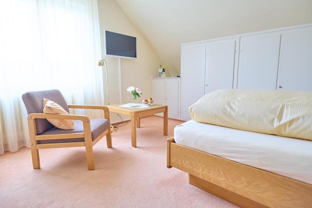 Postel nebo postele na pokoji v ubytování Hotel Morgensonne