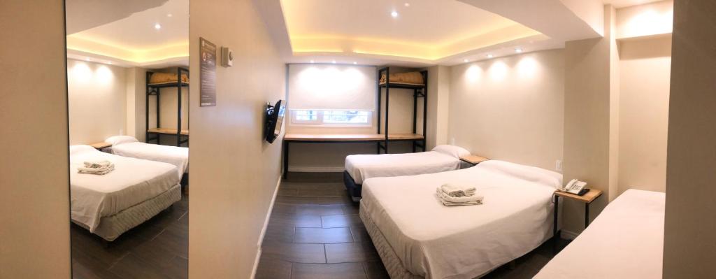 Cama ou camas em um quarto em Hotel Monaco