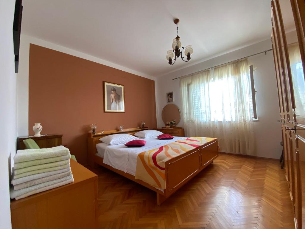 Posteľ alebo postele v izbe v ubytovaní Jarmila