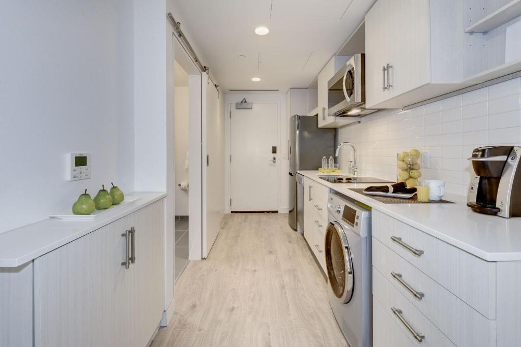 Kuchyň nebo kuchyňský kout v ubytování Placemakr Dupont Circle