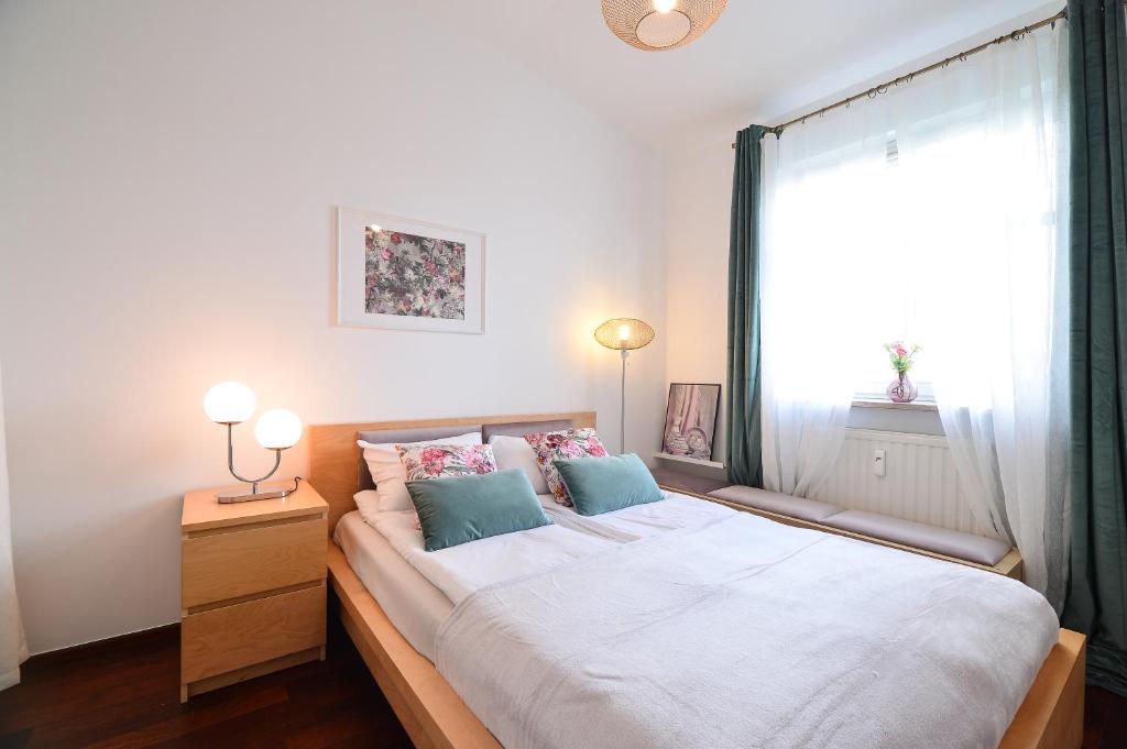 Postel nebo postele na pokoji v ubytování CITYSTAY Parkur Sopot Apartment