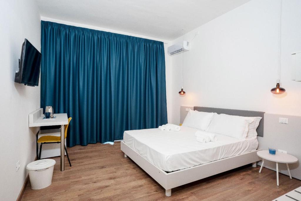Posteľ alebo postele v izbe v ubytovaní Sorrento B&D Rooms