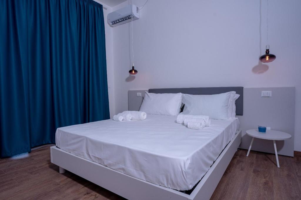 Posteľ alebo postele v izbe v ubytovaní Sorrento B&D Rooms