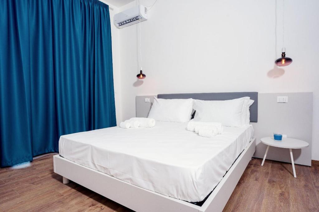 Posteľ alebo postele v izbe v ubytovaní Sorrento B&D Rooms