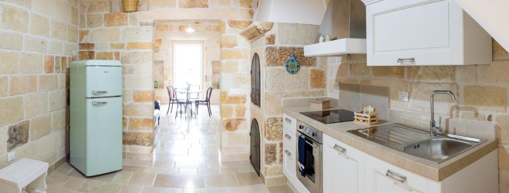 Kuchnia lub aneks kuchenny w obiekcie Suite Polignano