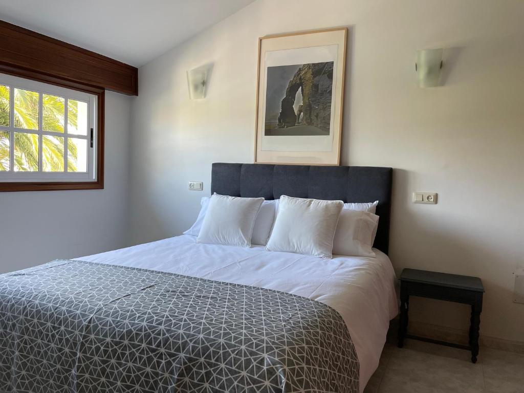 Posteľ alebo postele v izbe v ubytovaní Tranquilidad con piscina en Casa Nantes en Sanxenxo