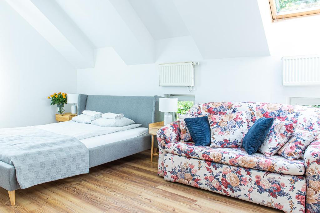 Posteľ alebo postele v izbe v ubytovaní Apartament Piastowska