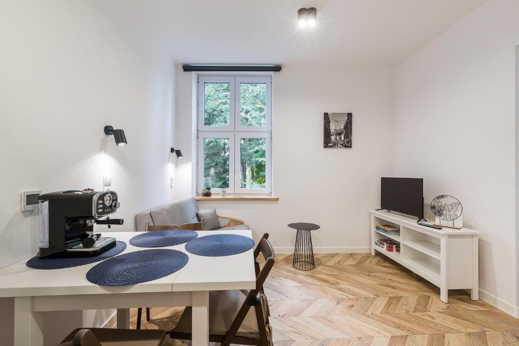 Svetainės erdvė apgyvendinimo įstaigoje Apartament na Plantach