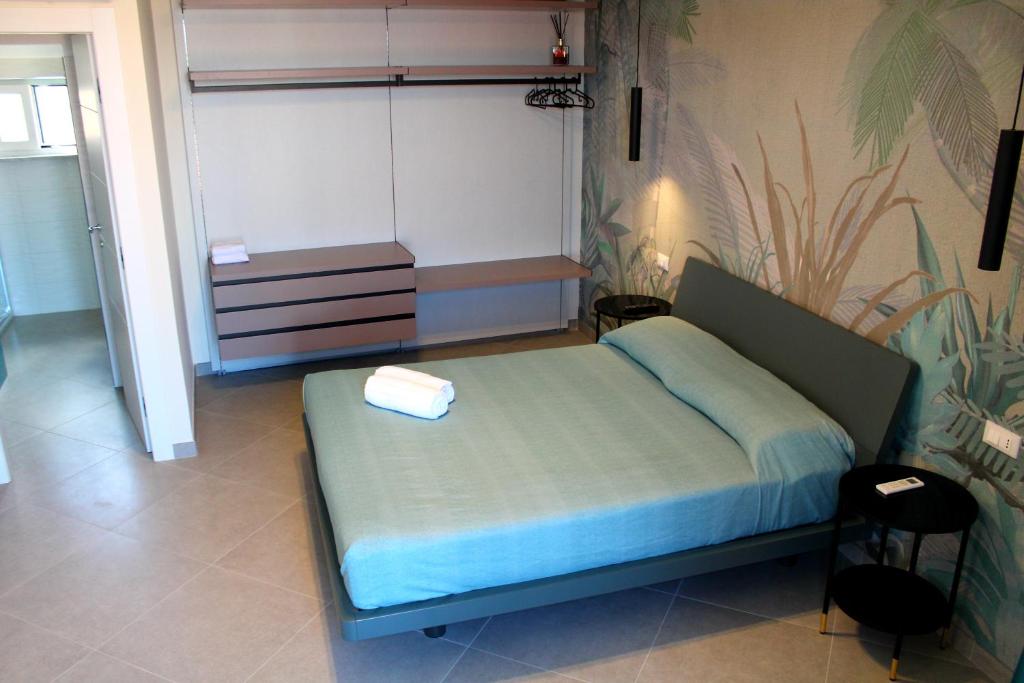 Postel nebo postele na pokoji v ubytování Margiò House
