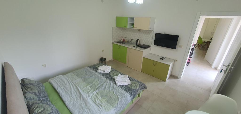 TV a/nebo společenská místnost v ubytování Antonio Apartments