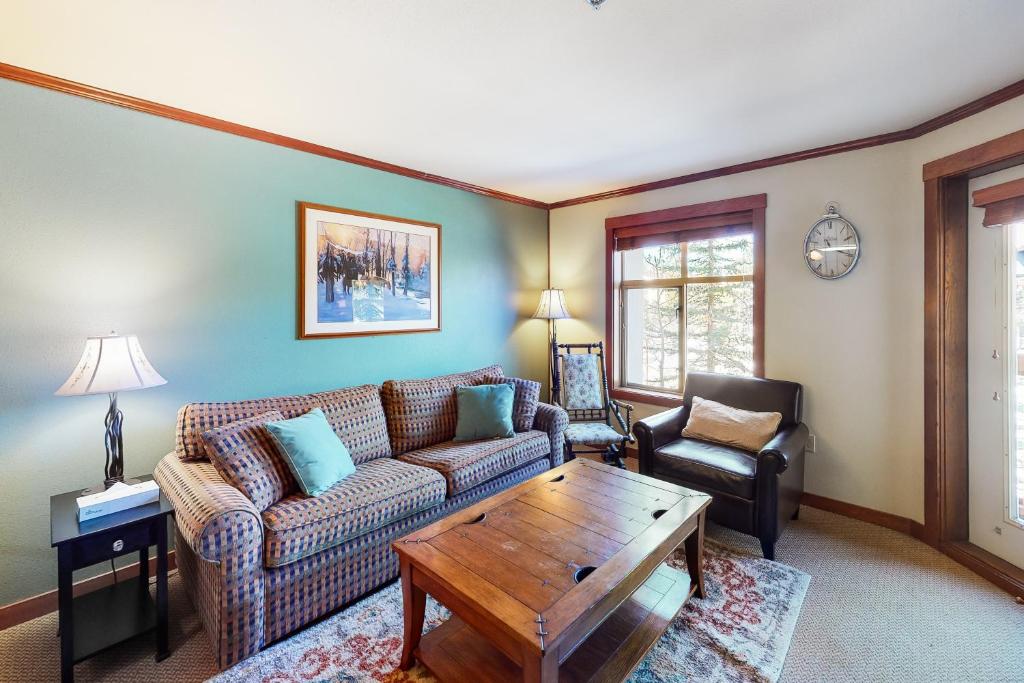 a living room with a couch and a coffee table at Powderhorn Lodge 214 Perfect Solitude Escape in Solitude