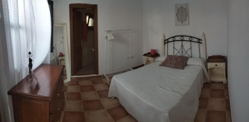 Postel nebo postele na pokoji v ubytování Aptos con piscina El Flamboyán 1