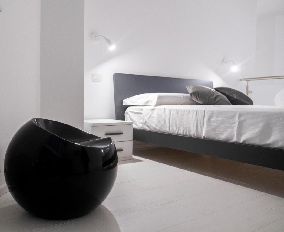Posteľ alebo postele v izbe v ubytovaní Dadà Loft