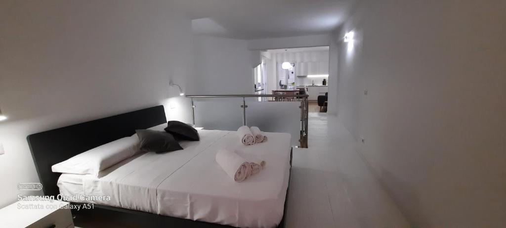 Posteľ alebo postele v izbe v ubytovaní Dadà Loft