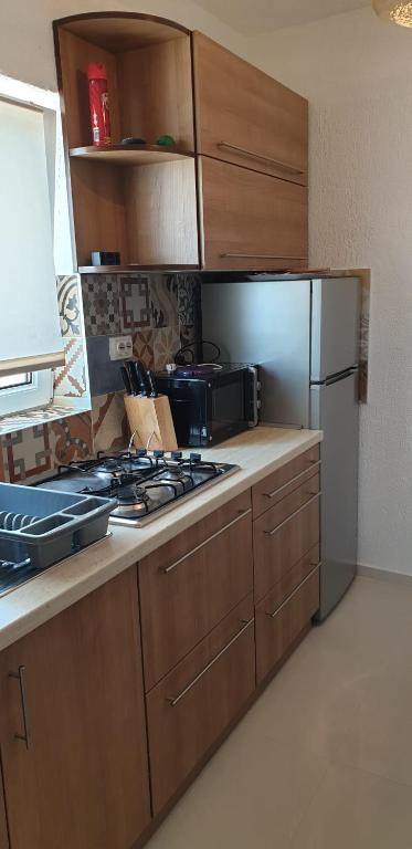 Kuchyňa alebo kuchynka v ubytovaní Apartments Marecic