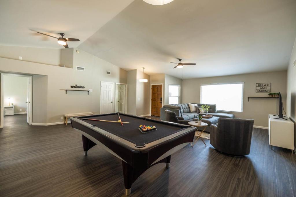 a living room with a pool table in it at Glendale Keim home in Glendale