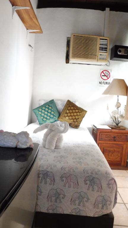 Postel nebo postele na pokoji v ubytování Posada Casa Adriana