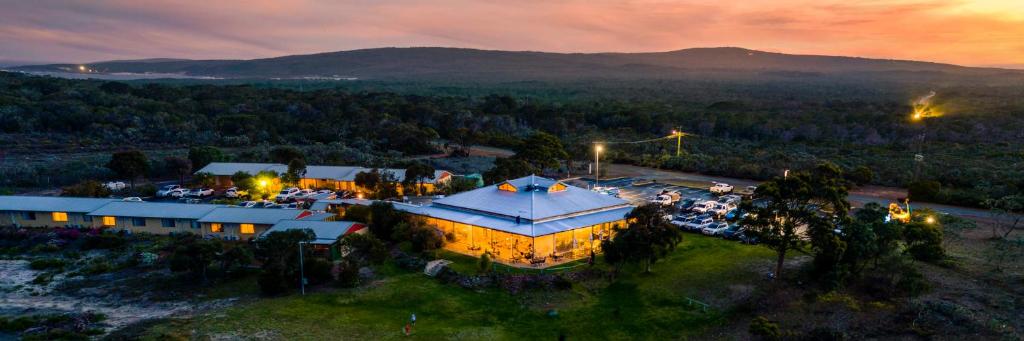 an aerial view of a large building with a tent at Bremer Bay Resort in Bremer Bay