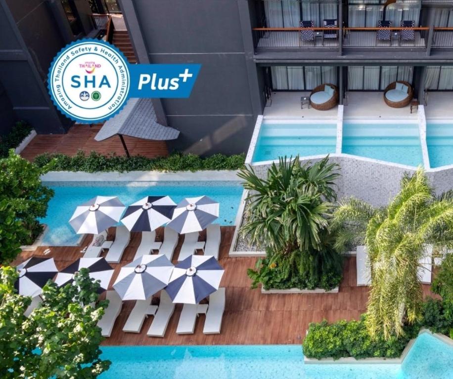 a view of the pool at the shka plus hotel at Panan Krabi Resort - SHA Plus in Ao Nang Beach