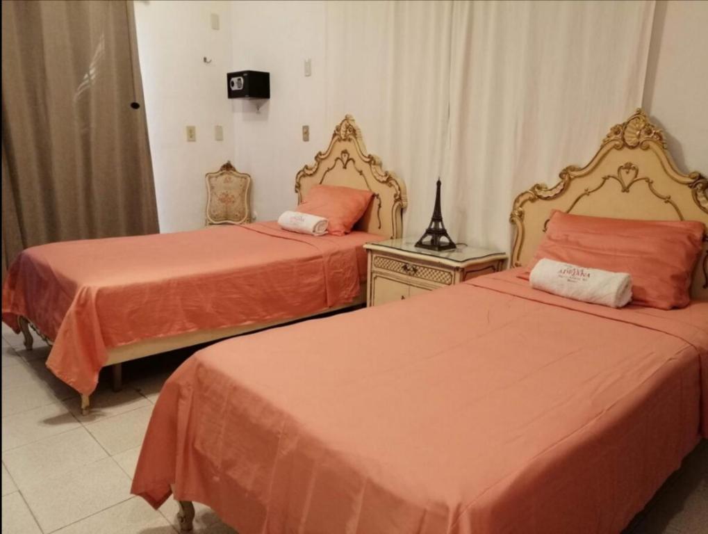Postel nebo postele na pokoji v ubytování Posada Casa Adriana