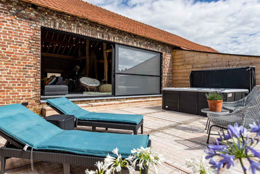 Patio nebo venkovní prostory v ubytování De Hoeveschuur