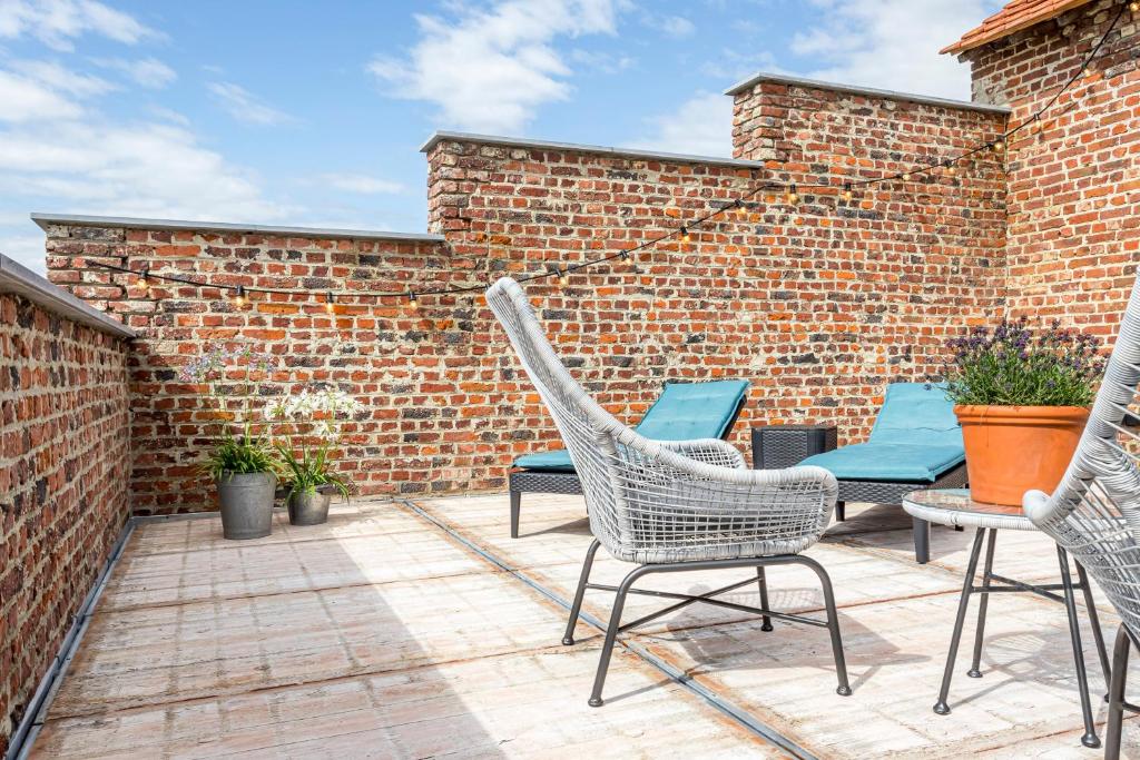 Patio nebo venkovní prostory v ubytování De Hoeveschuur