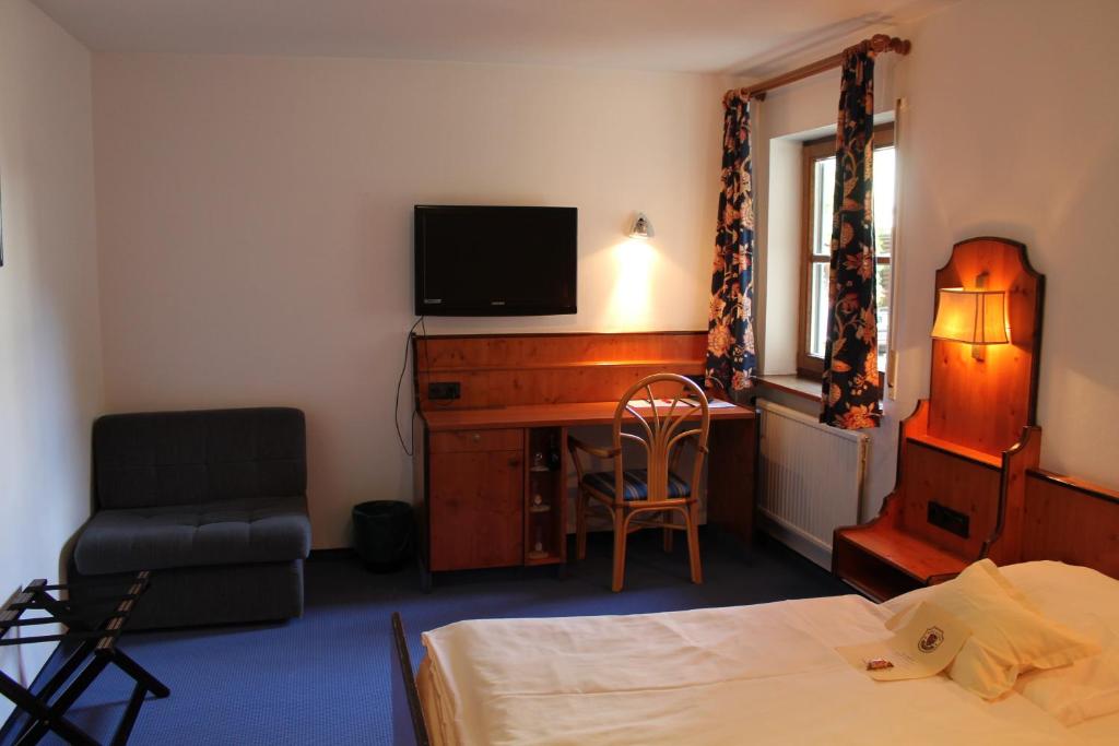 Postel nebo postele na pokoji v ubytování Hotel Höfler B&B