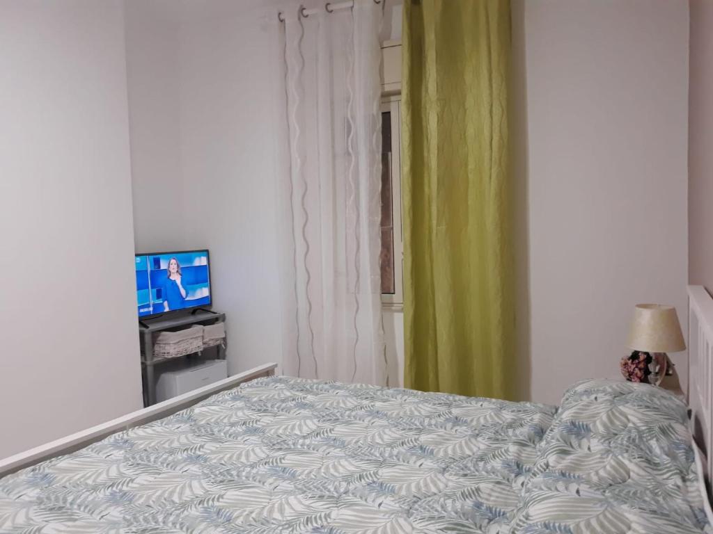 TV a/nebo společenská místnost v ubytování B&B Salita Metello