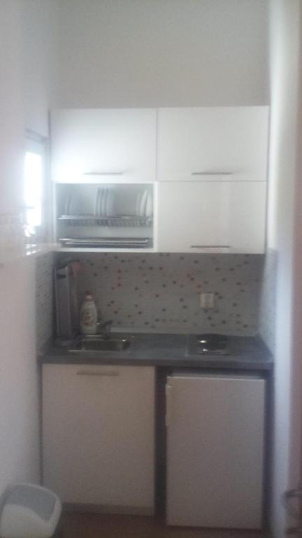 Kuchyňa alebo kuchynka v ubytovaní Apartmani Glavina
