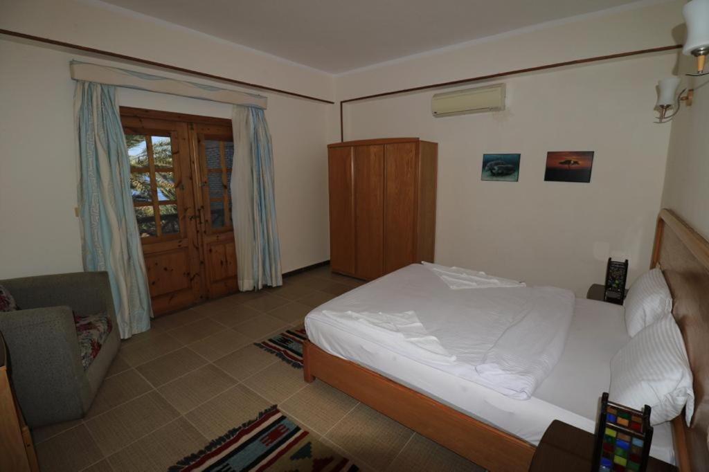 Postel nebo postele na pokoji v ubytování Acacia Dahab Hotel
