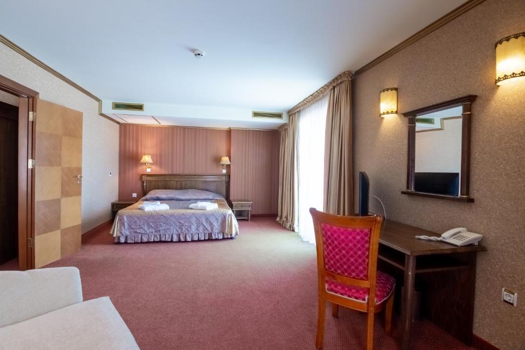 Postel nebo postele na pokoji v ubytování Hotel Mistral