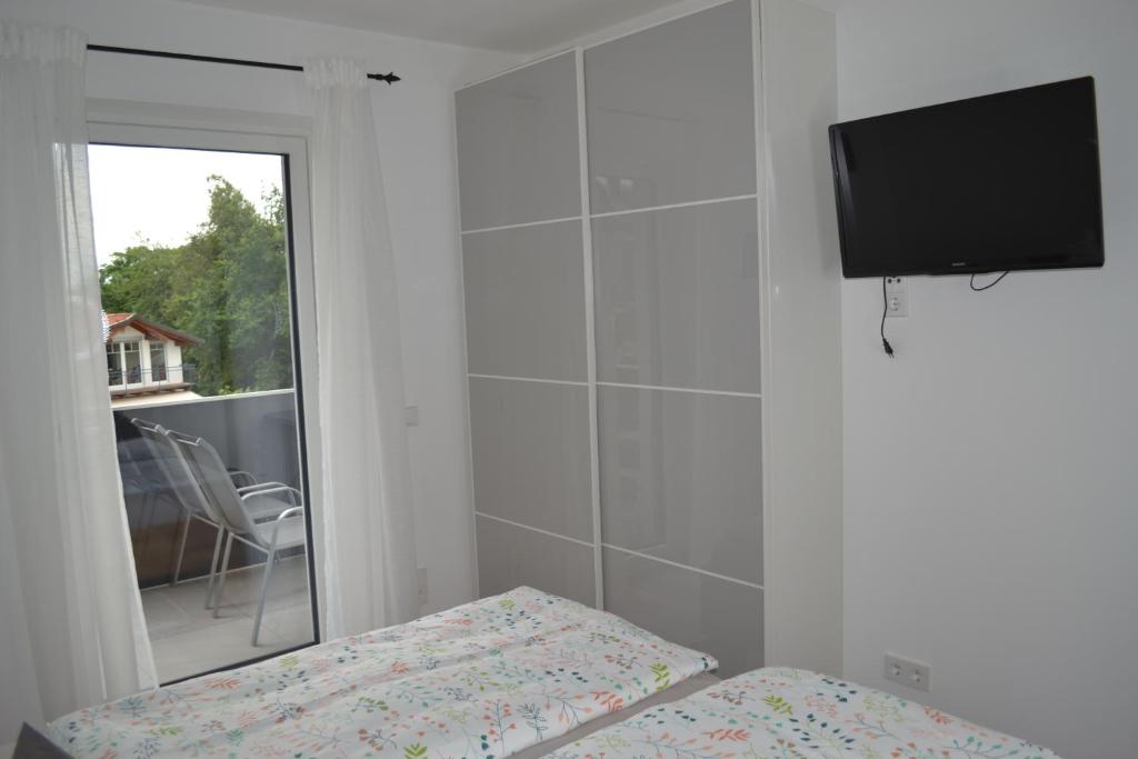 TV a/nebo společenská místnost v ubytování Apartment Uggowitzer